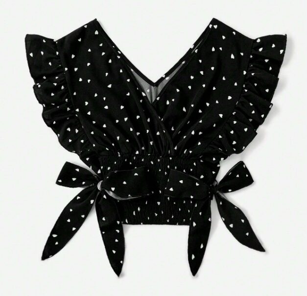 Captura-de-pantalla-2024-12-29-165723.jpg BLUSA CON ESTAMPADO DE CORAZÓN CON LAZO LATERAL - Imagen 1
