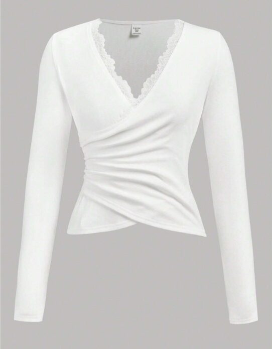 Captura-de-pantalla-2024-12-29-183103.jpg TOP DE PUNTO BLANCO CEÑIDO CON CINTURA FRUNCIDA DE ENCAJE - Imagen 1