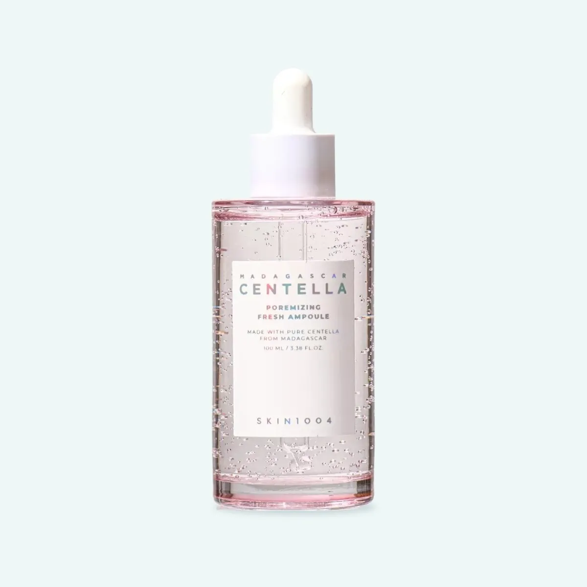 SKIN1004-madagascar-centella-poremizing-fresh-ampoule-100ml-bg.webp MADAGASCAR CENTELLA POREMIZING FRESH AMPOULE - Imagen 1
